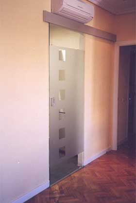 Ejemplo de montaje de puerta de cristal corredera