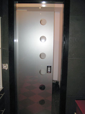 Ejemplo de montaje de puerta de cristal corredera