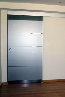 Ejemplo de montaje de puerta de cristal corredera